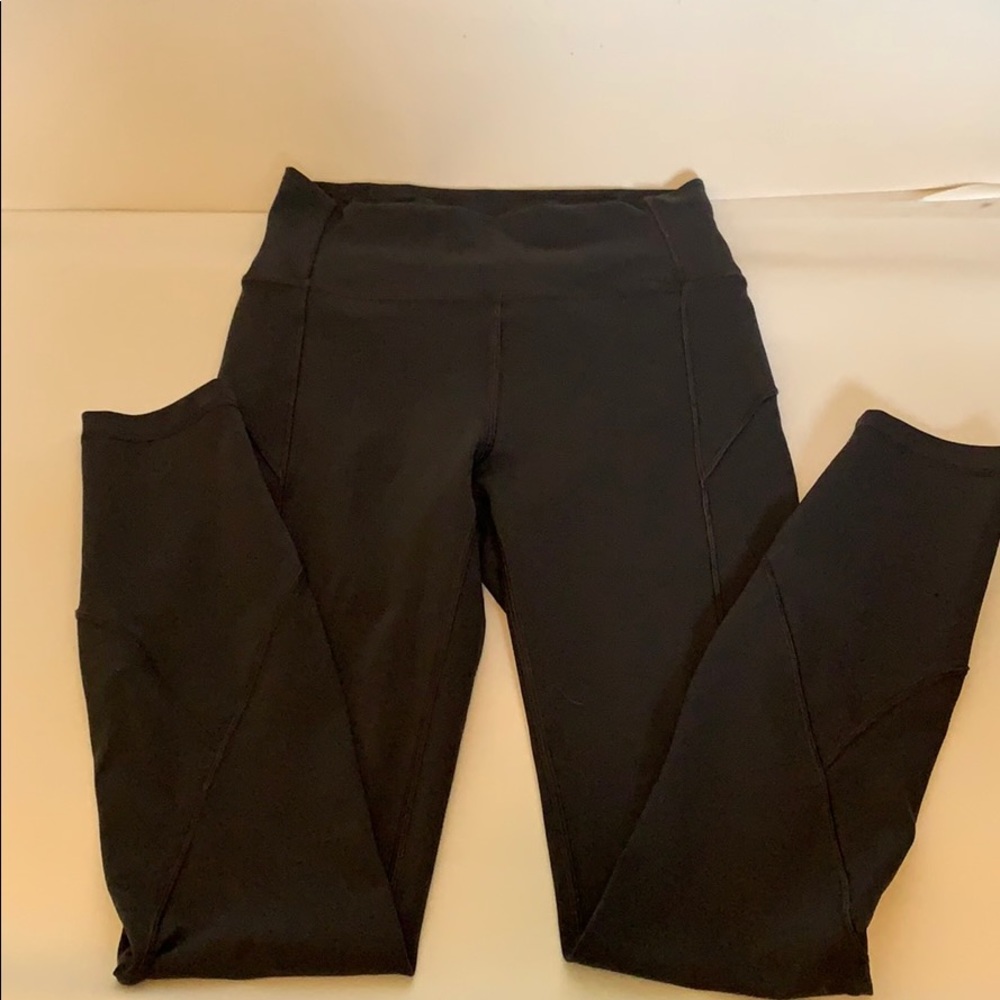 Womens Lululemon leggings, lt black, size 4